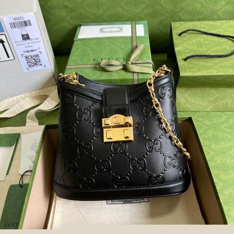 G*u*i satchel bags